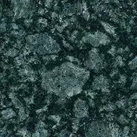 A close up of a green granite counter top.