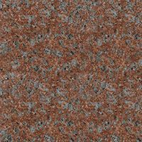 A close up of a red granite counter top.