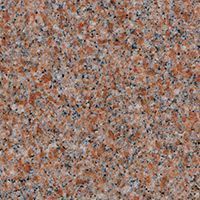 A close up of a pink granite counter top.