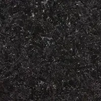 A close up of a black granite counter top.