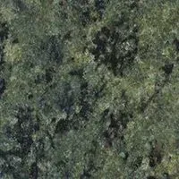 A close up of a green granite counter top.