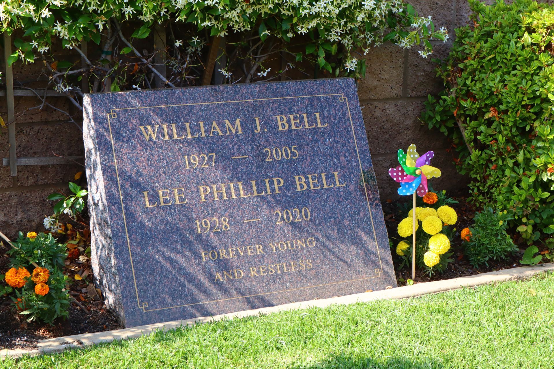A gravestone for william j. bell and lee phillip bell