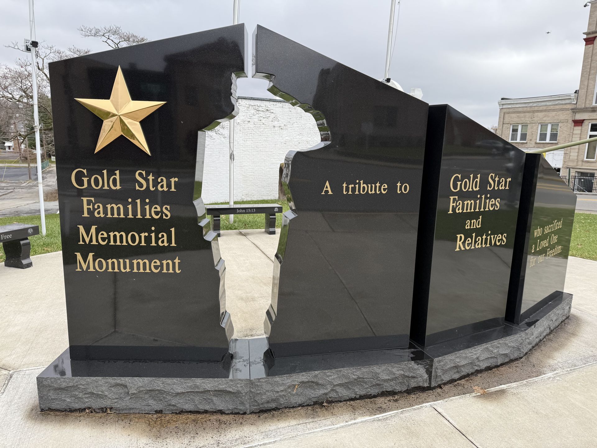 A gravestone with the word love carved into it