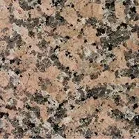 A close up of a granite counter top with a marble texture.