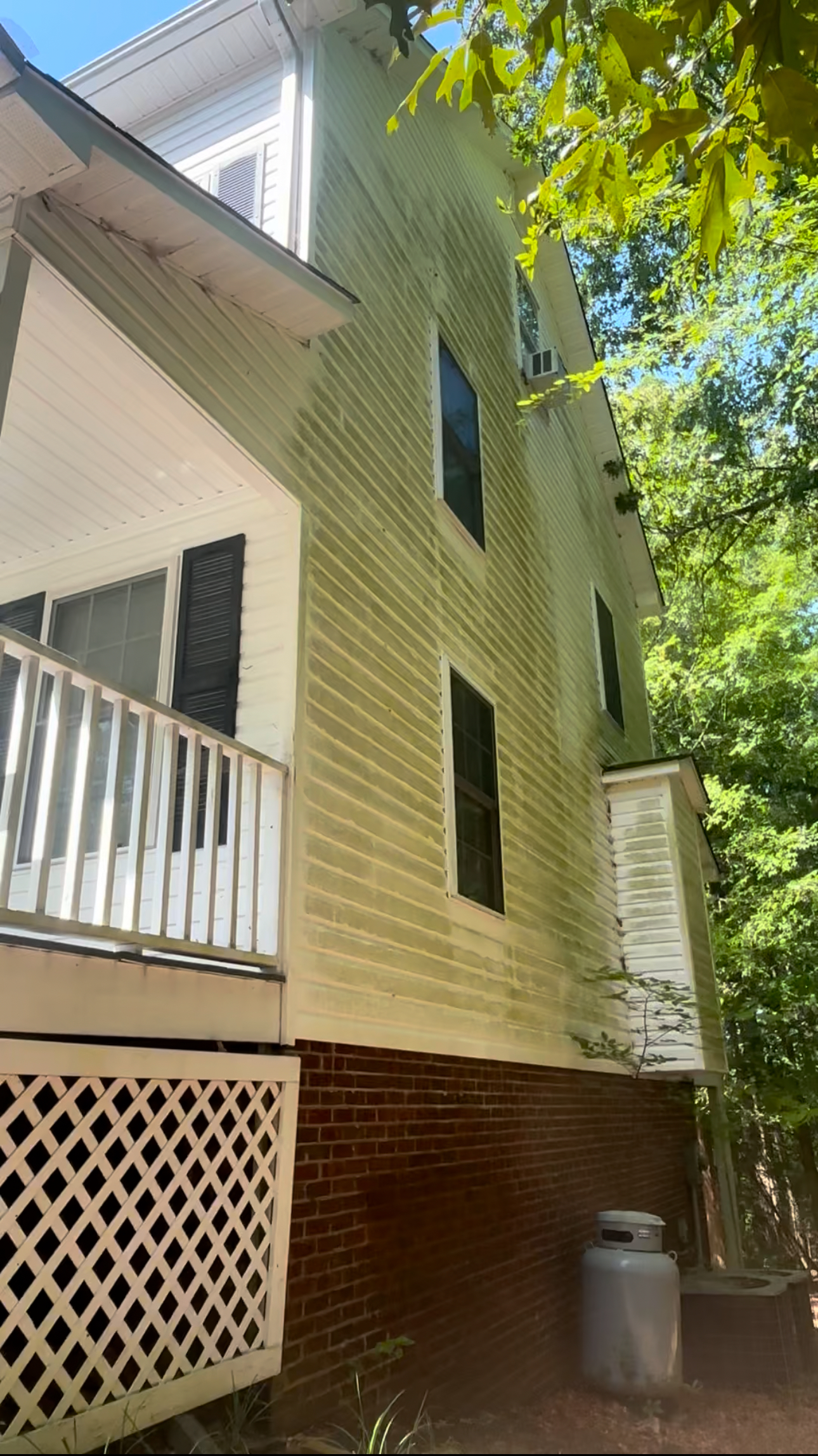 A before and after photo of a concrete driveway with grass growing out of it.