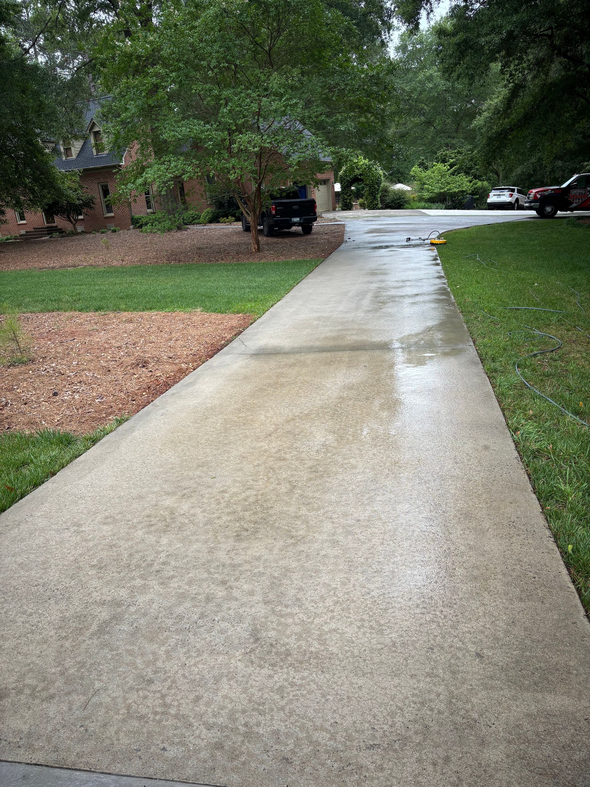 A concrete sidewalk with the words `` after '' written on it.