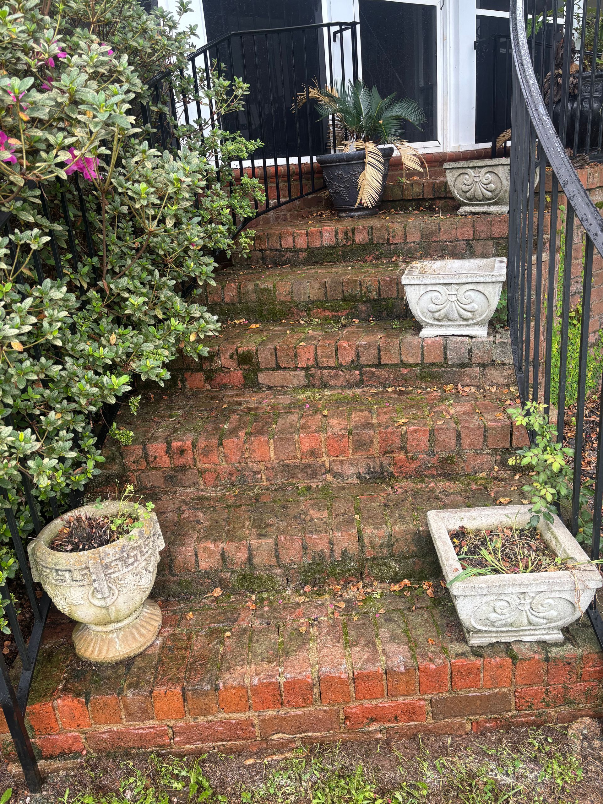 A house with a dirty siding and a window.
