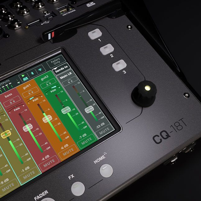 Close-up of a CQ-18T digital mixer with touchscreen and control knob, displaying audio levels on screen.