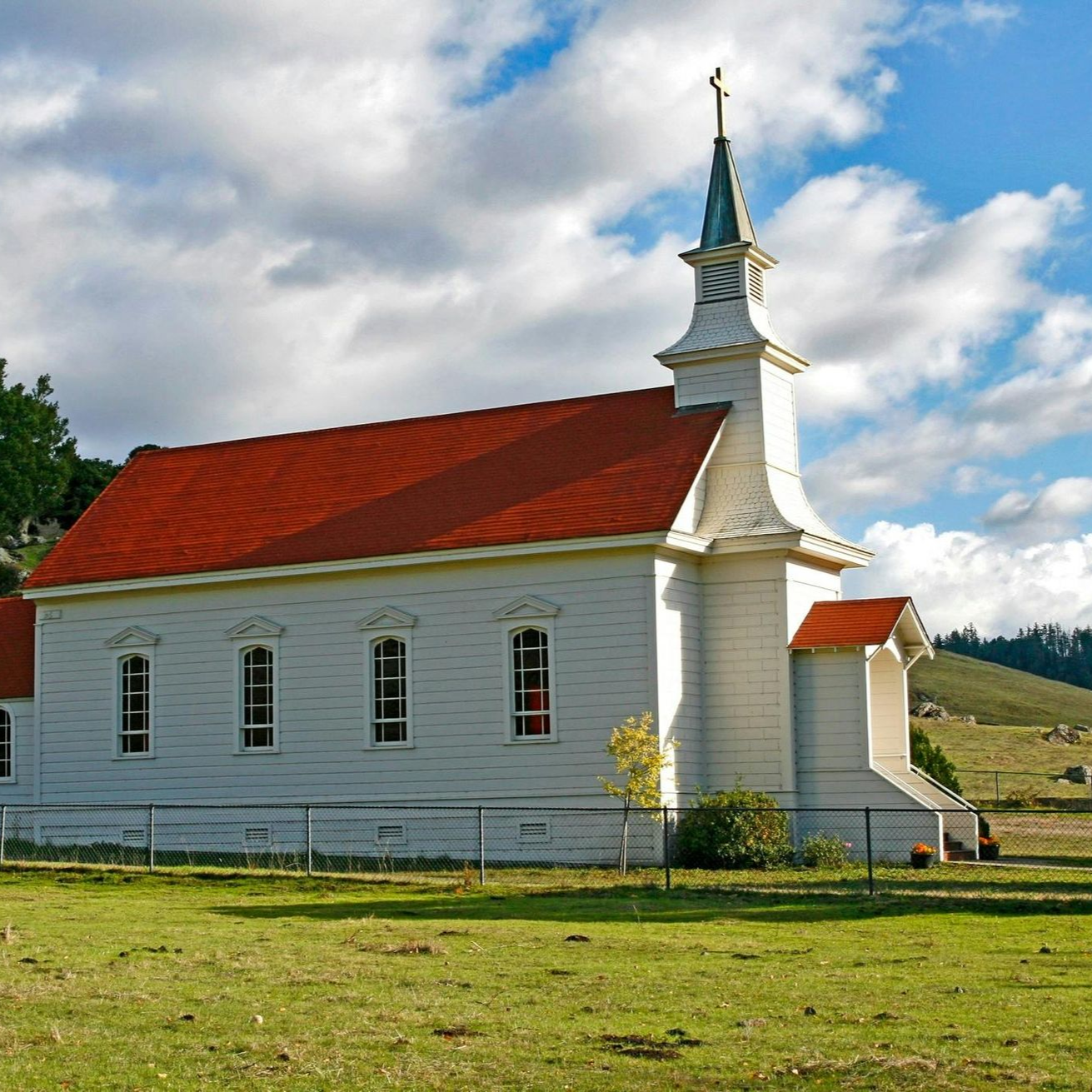 A group of people are having a party with balloons and confetti.