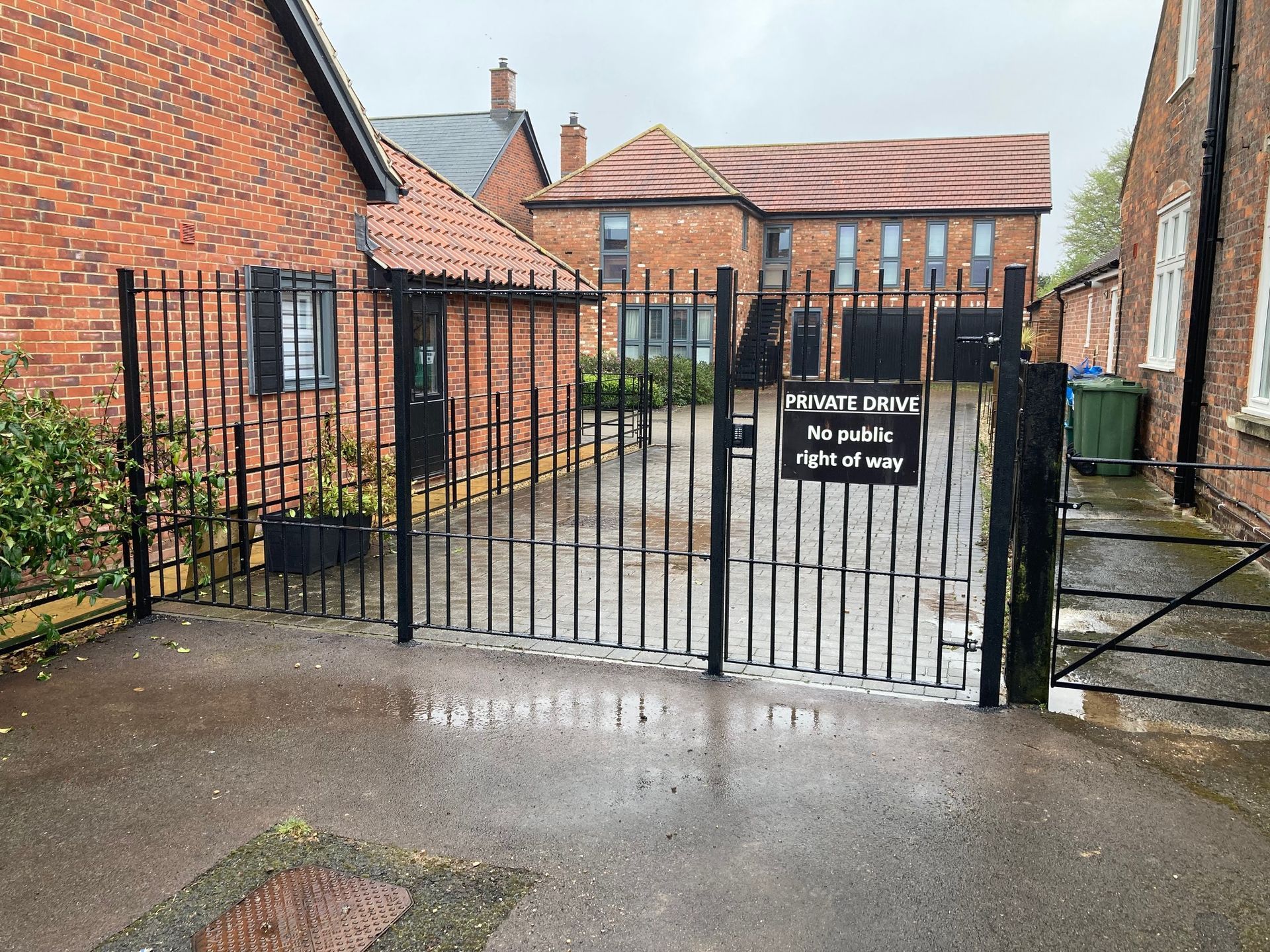 Black metal gate with