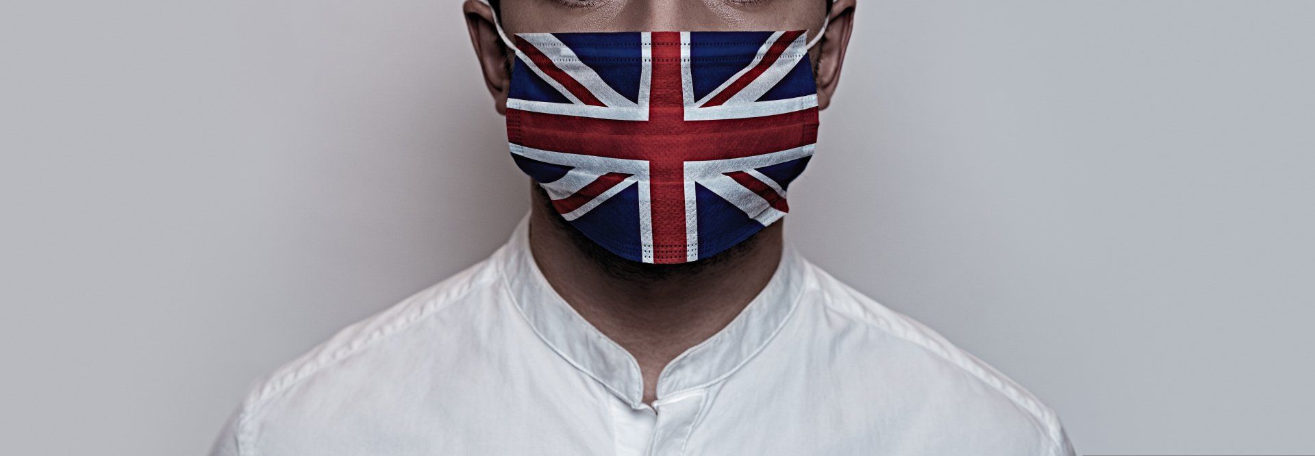 Man wearing Union Jack facemask