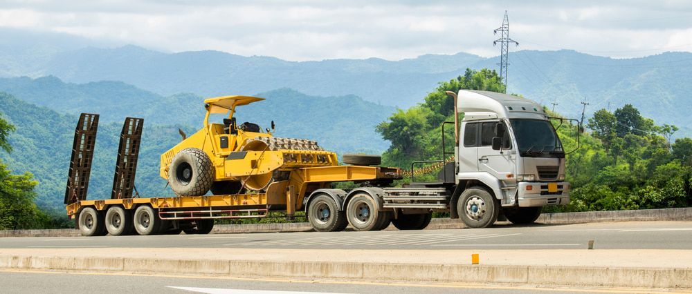 A Row Of Trailers Are Parked In A Parking Lot — Eclipse Hire In  Cairns, QLD
