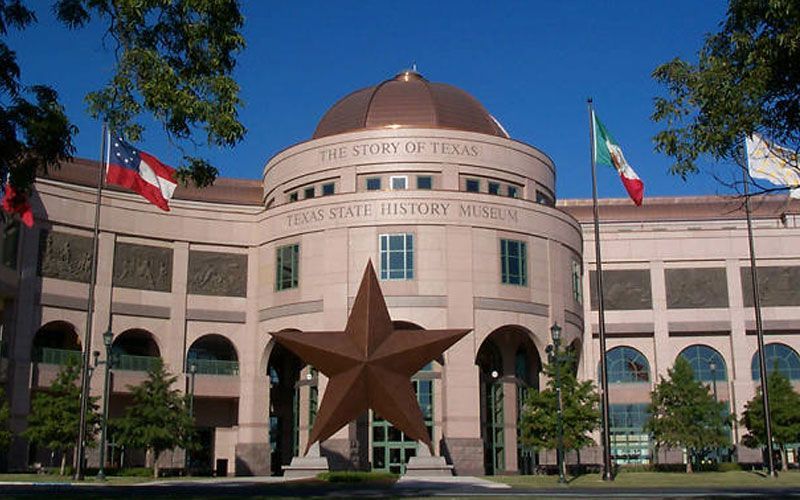 The story of texas museum has a large star in front of it