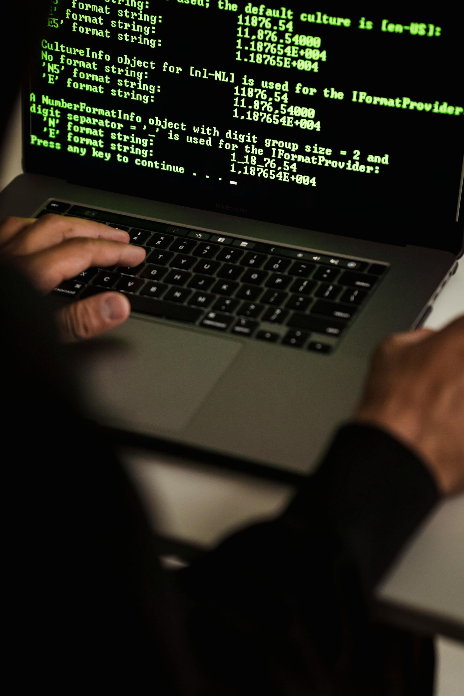A woman is standing next to a computer screen that says google lighthouse