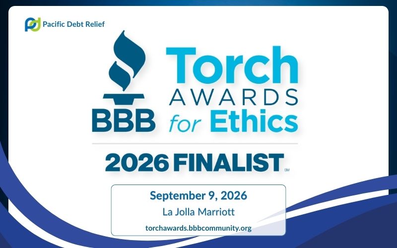 Pacific Debt Relief 2026 BBB Torch Awards for Ethics Finalist badge framed with navy blue border and