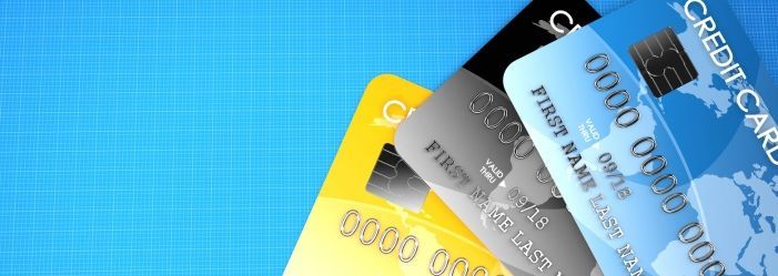 The image shows three credit cards, representing the theme of optimizing credit card use, with emphasis on smart management, responsible spending, and maximizing financial benefits.