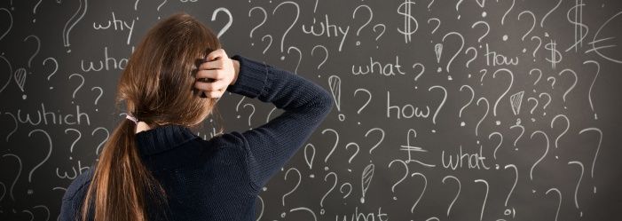Image of a lady deep in thought, surrounded by question marks symbolizing her confusion about bankruptcy, reflecting the common inquiries and complexities addressed in the comprehensive FAQs and specifics of the bankruptcy process