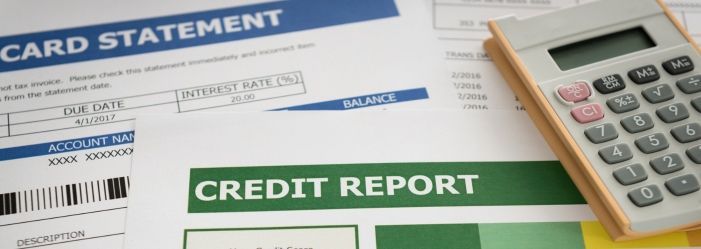 Image depicting the concept of Credit Health Management, featuring financial documents, credit card statements, and a credit score chart, symbolizing the strategic monitoring and improvement of one's credit status.