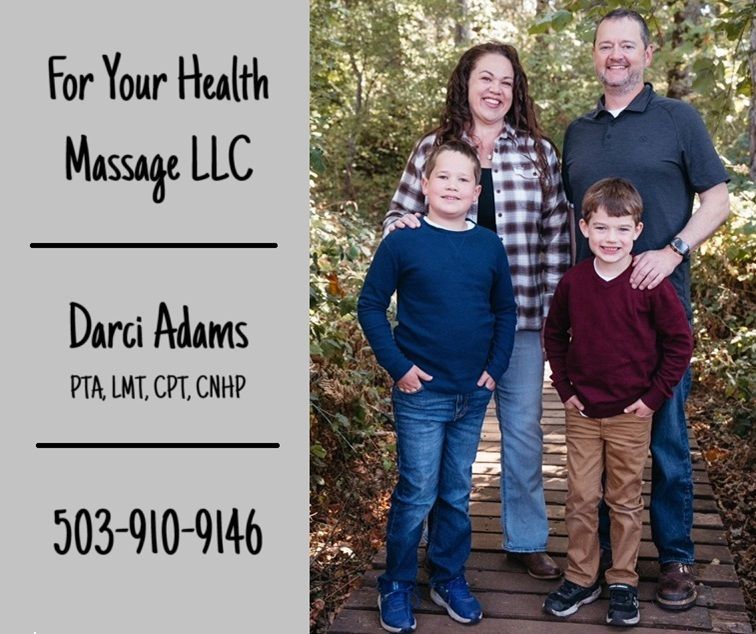 A family posing for a picture for darci adams massage llc