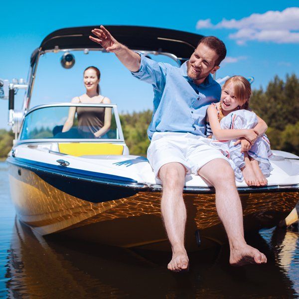 Family In A Boat — Woodland, CA — Jack Cramer Insurance