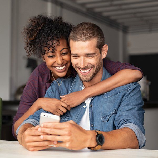 Smiling Couple — Woodland, CA — Jack Cramer Insurance