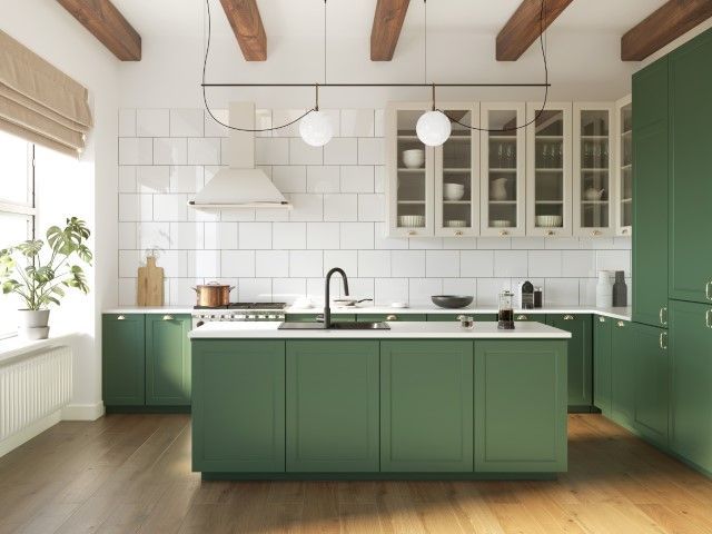 Newly remodeled kitchen with island and green cabinets