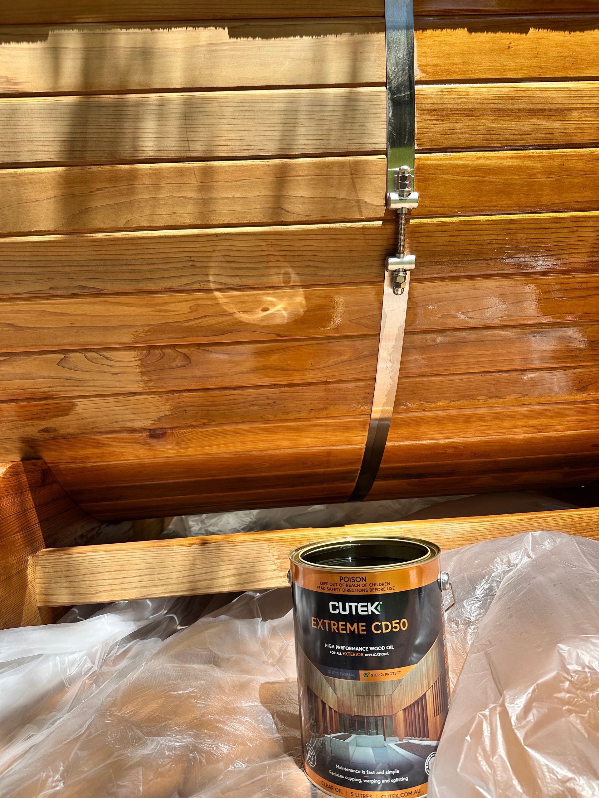 timber oiling and strap tightening 