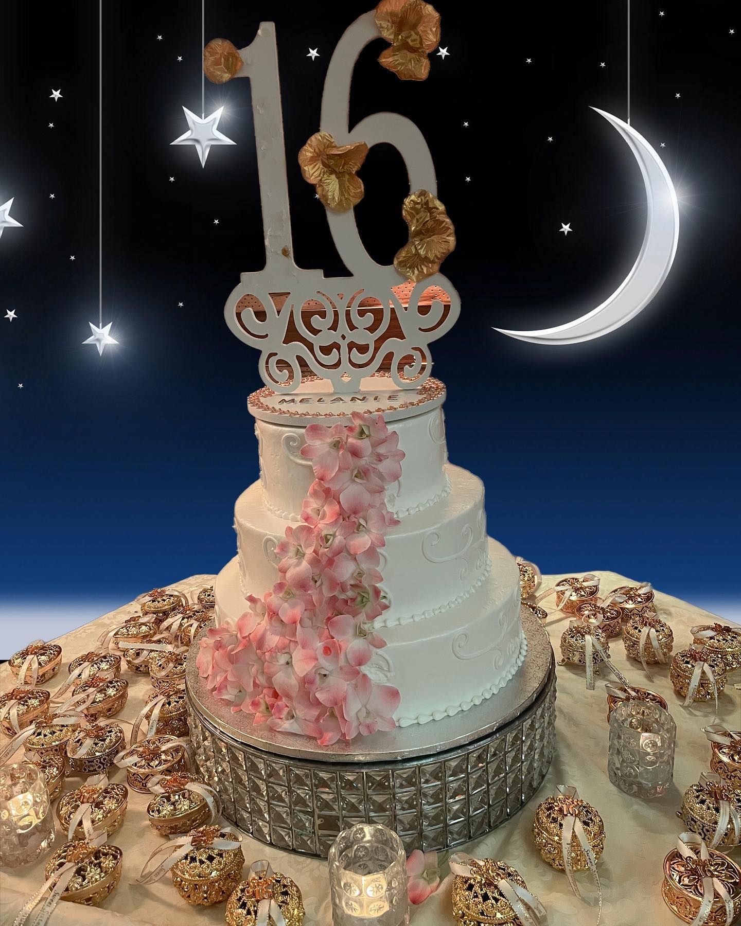 A cake with the number 16 on top of it