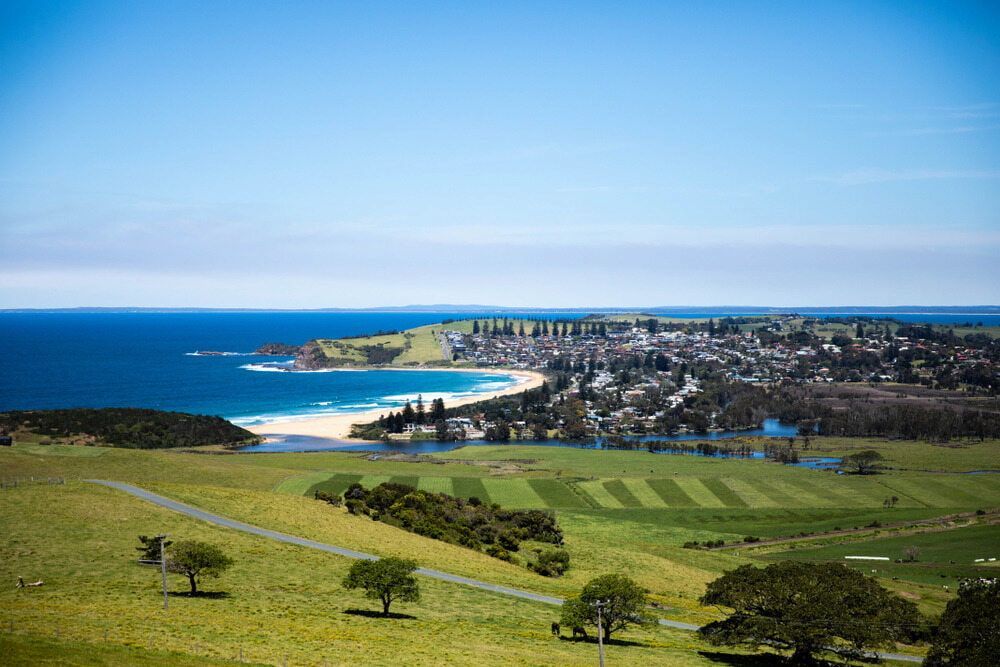 A View of a Golf Course and a Beach From a Hill Overlooking the Ocean — Optimum Towing in Gerringong, NSW