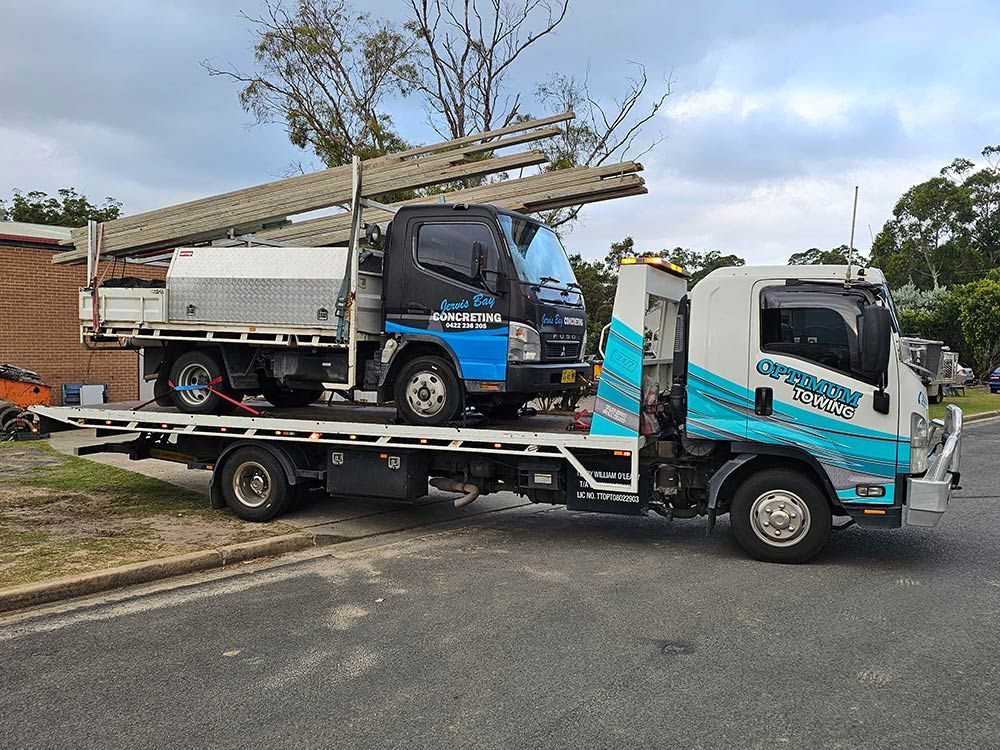 Black Truck is Towed By Optimum Towing — Optimum Towing in Bomaderry, NSW