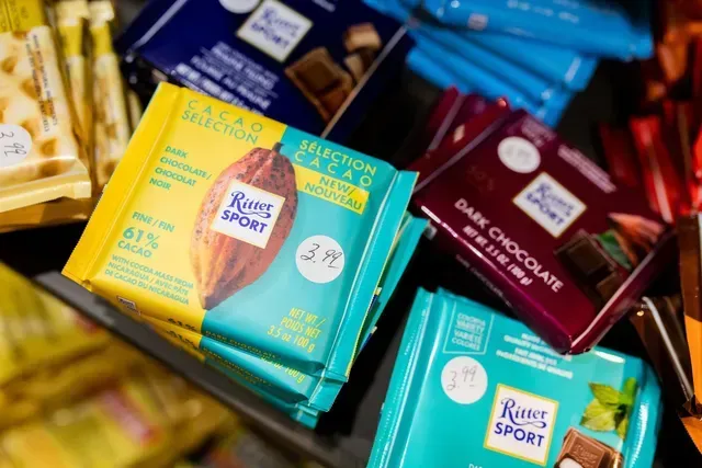 Assorted colorful Roasty Sport chocolate bars arranged in a store display