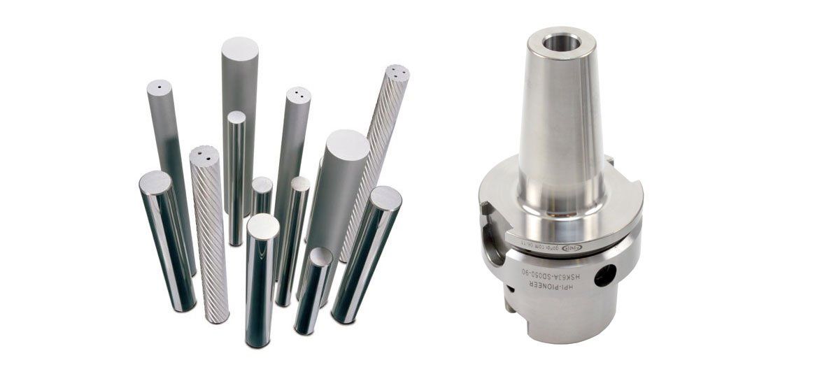 A bunch of sticks and a drill bit on a white background.