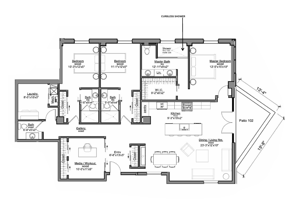 Floor plan of a residence with a kitchen, living area, bedrooms, bathrooms, and laundry room.