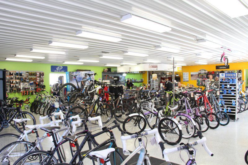A Large Room Filled With Lots of Bicycles in a Store