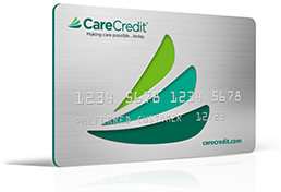 A silver and green carecredit credit card