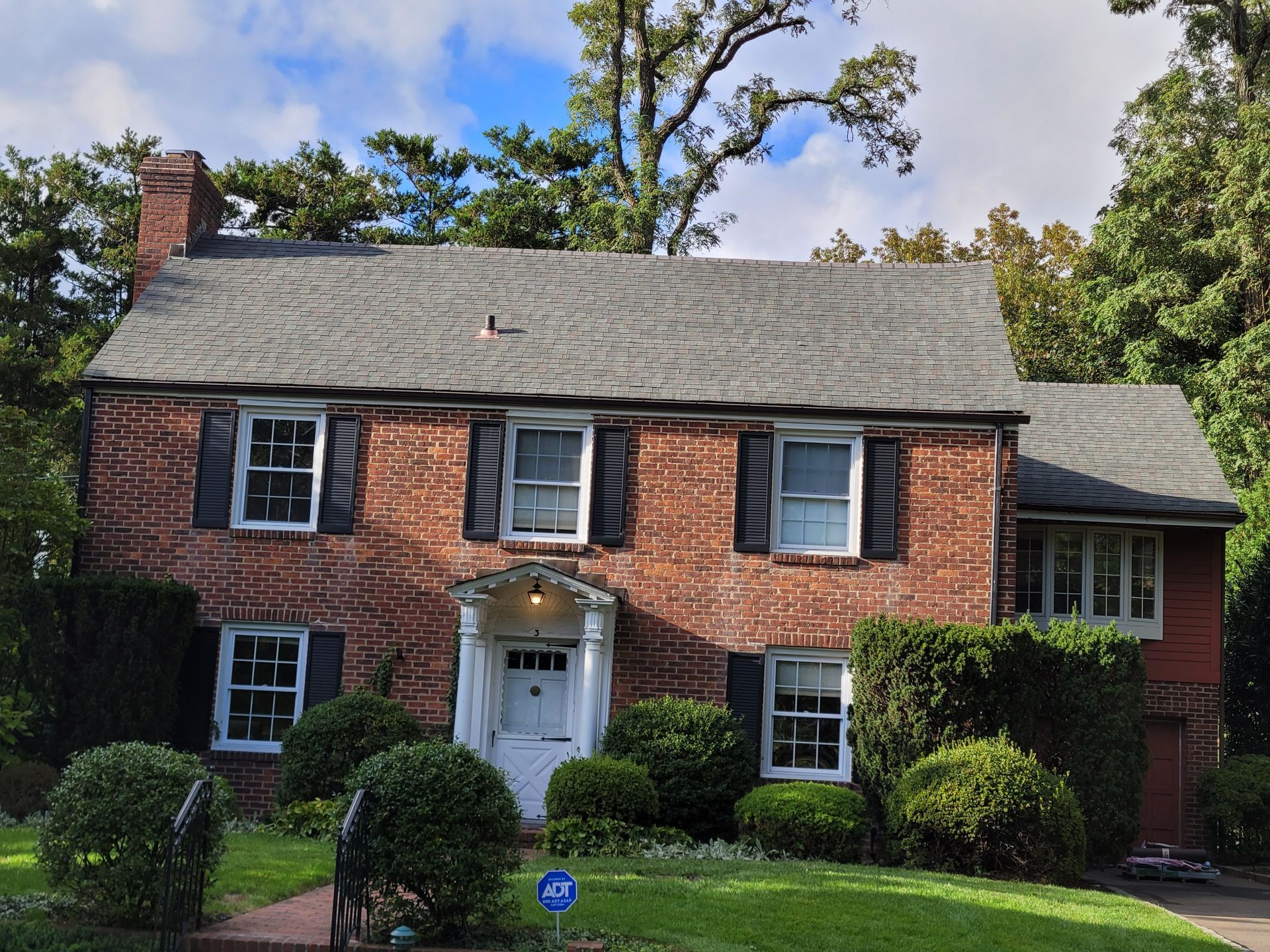 A roof with a lot of red tiles on it