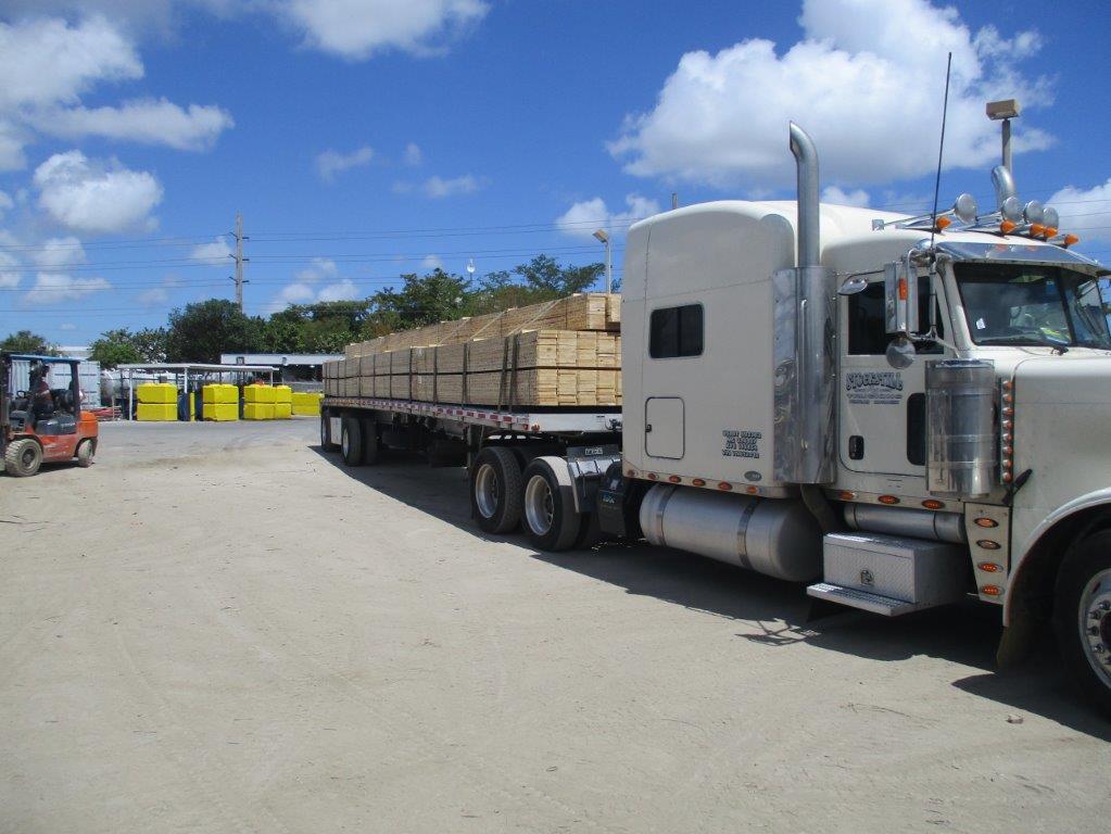 Wood Planks On The Truck — Miami, FL — J & M Scaffolds of Florida