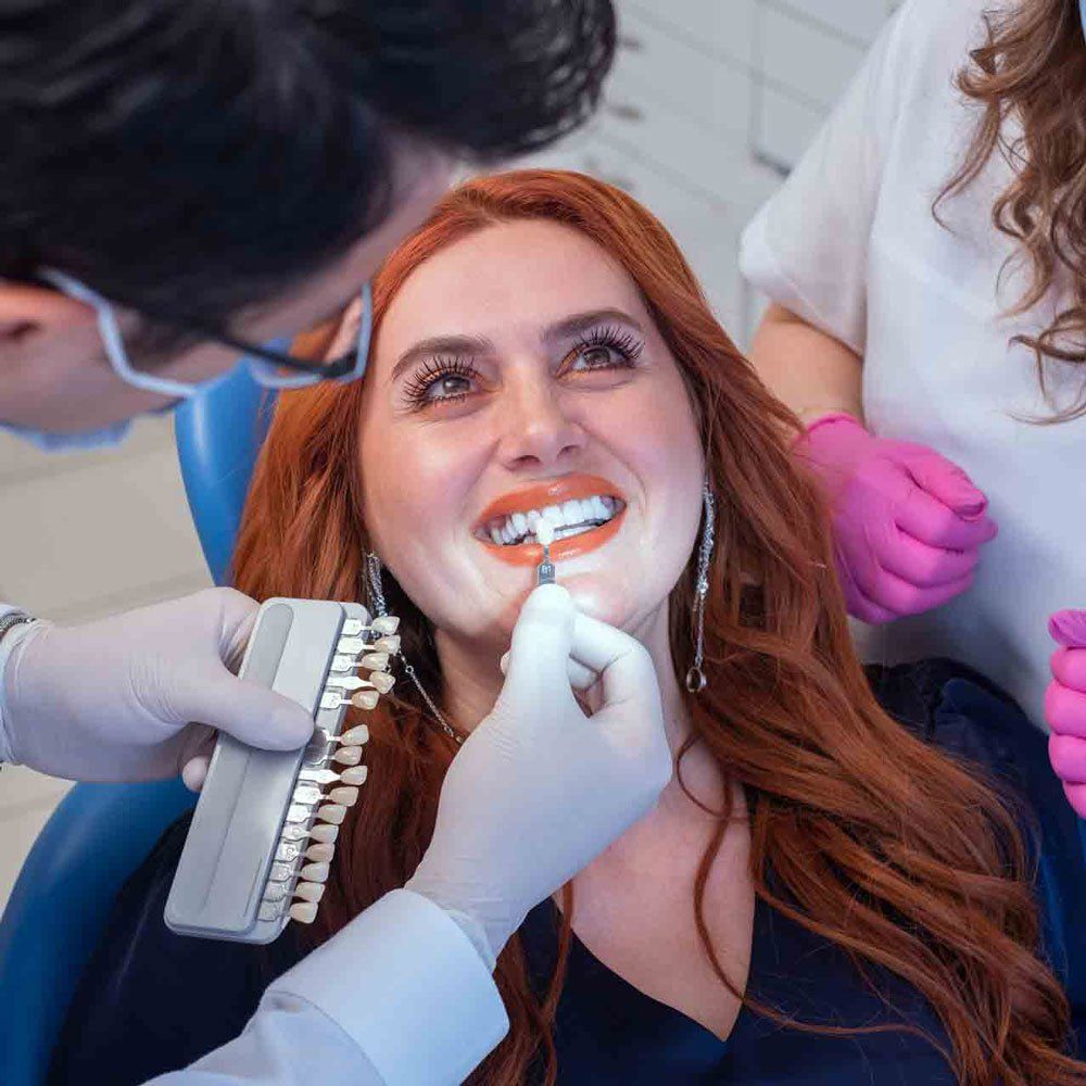 A Dentist Measuring the Teeth — Portage, IN — Airport Road Dental Associates, PC