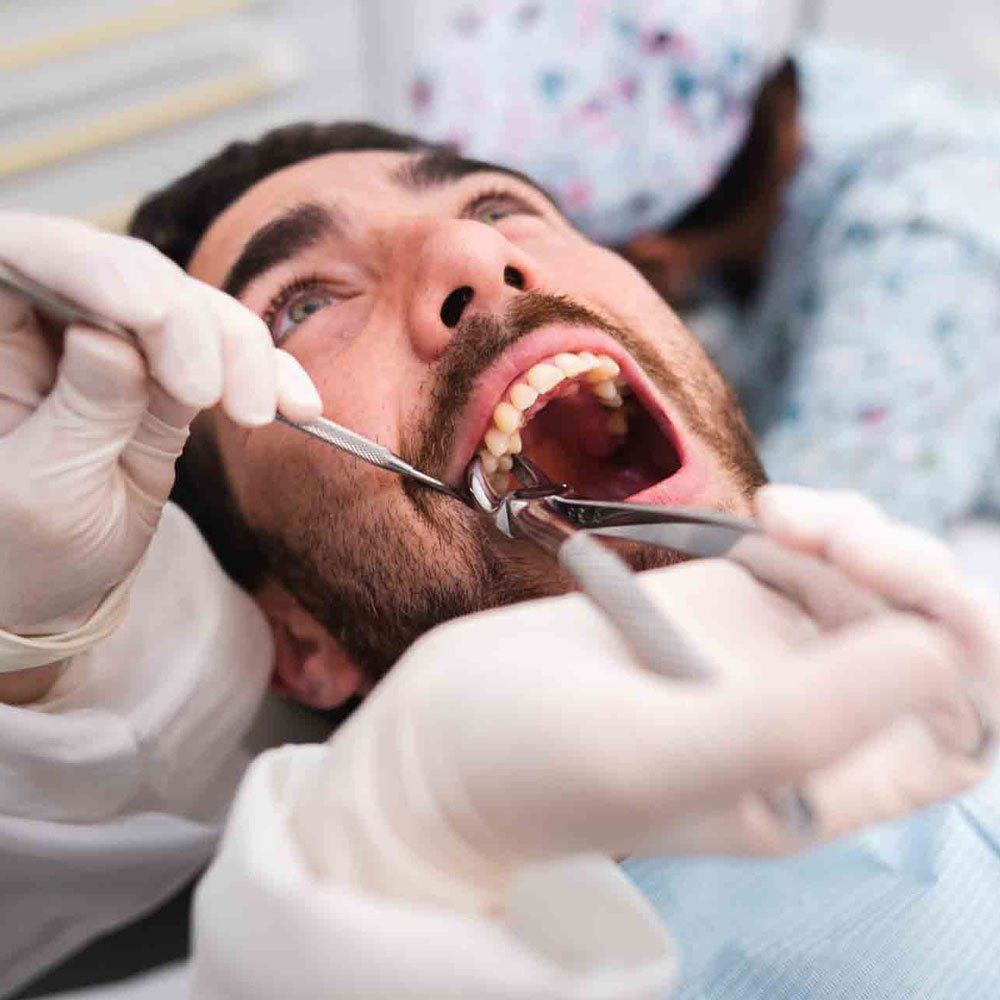 Root Planning on His Teeth — Portage, IN — Airport Road Dental Associates, PC