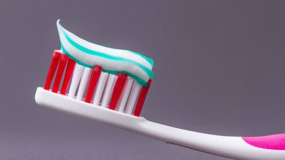 Toothbrush with Toothpaste — Portage, IN — Airport Road Dental Associates, PC