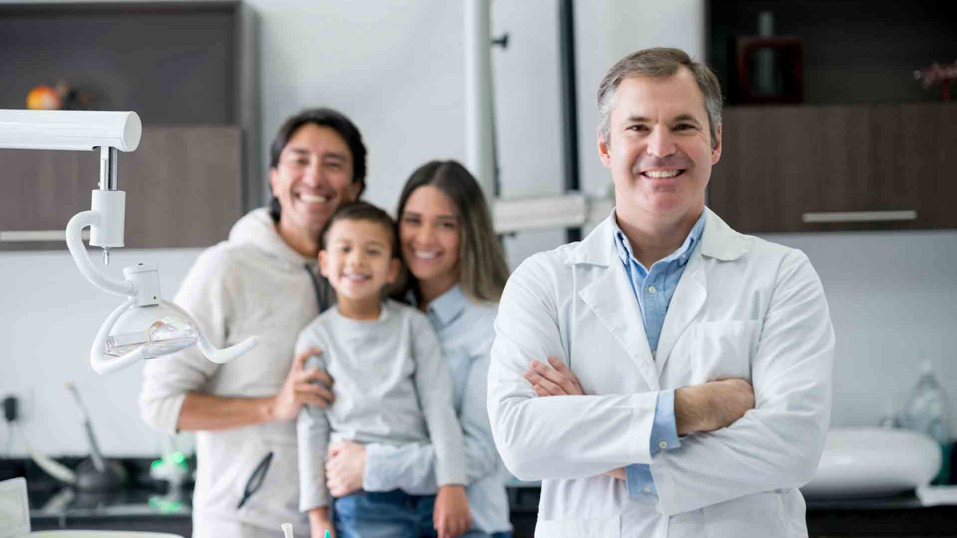 Dentist and A Happy Family — Portage, IN — Airport Road Dental Associates, PC