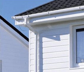 House with white cladding and new fascias and soffits