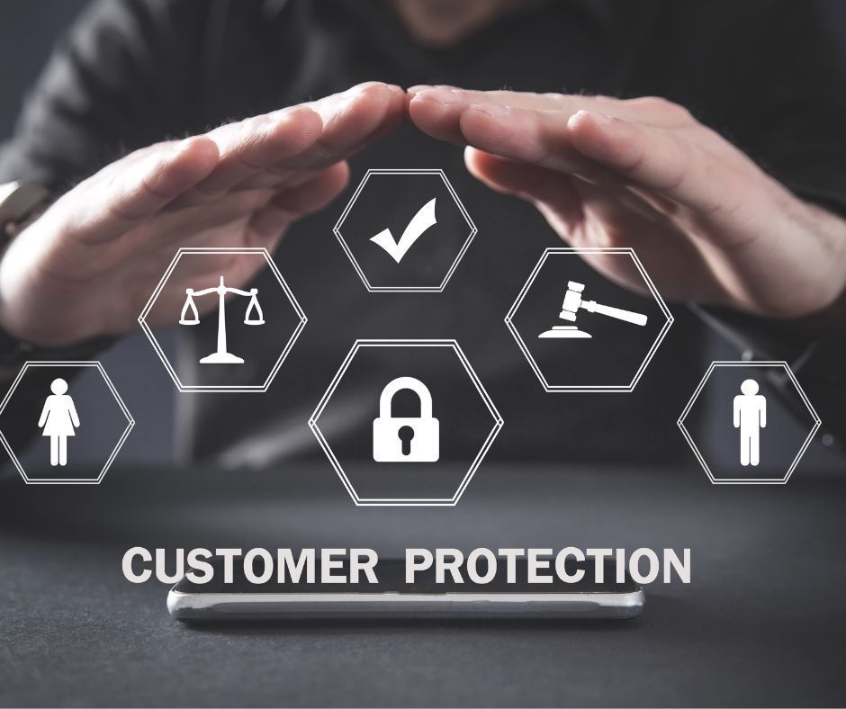 A man 's hands are covering a cell phone with icons for customer protection