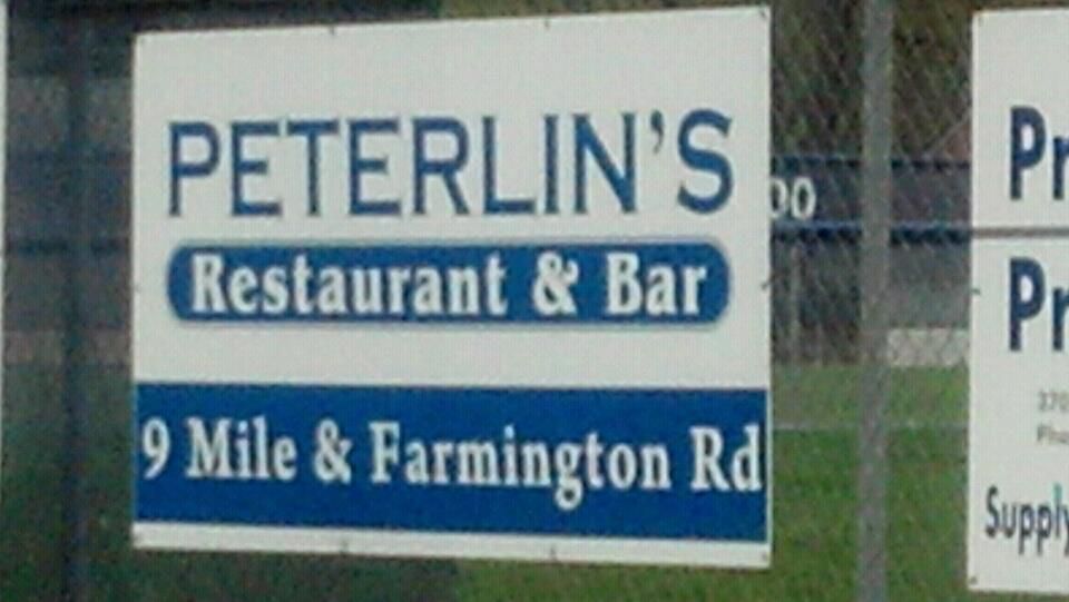 A sign for peterlin 's restaurant and bar.