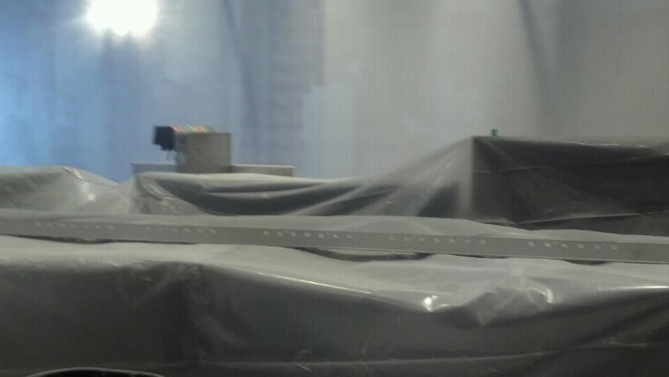 A room with a lot of plastic on the floor and walls.