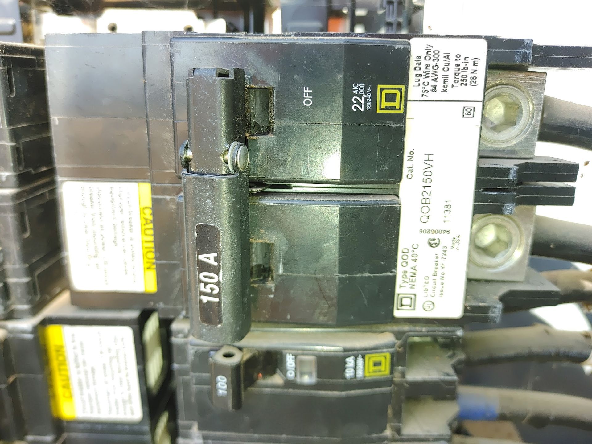 Electrical circuit breakers. Square D, 150 amp, labeled 22kA.