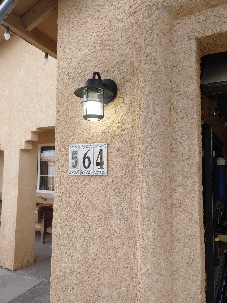 Exterior view of a building with address plaque 