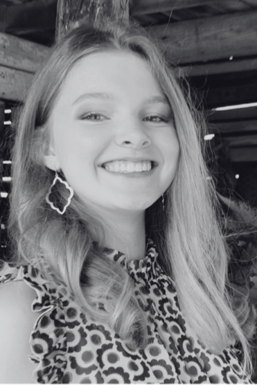 Black and white headshot of Emma Wright.