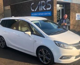 White Vauxhall looking brand new.