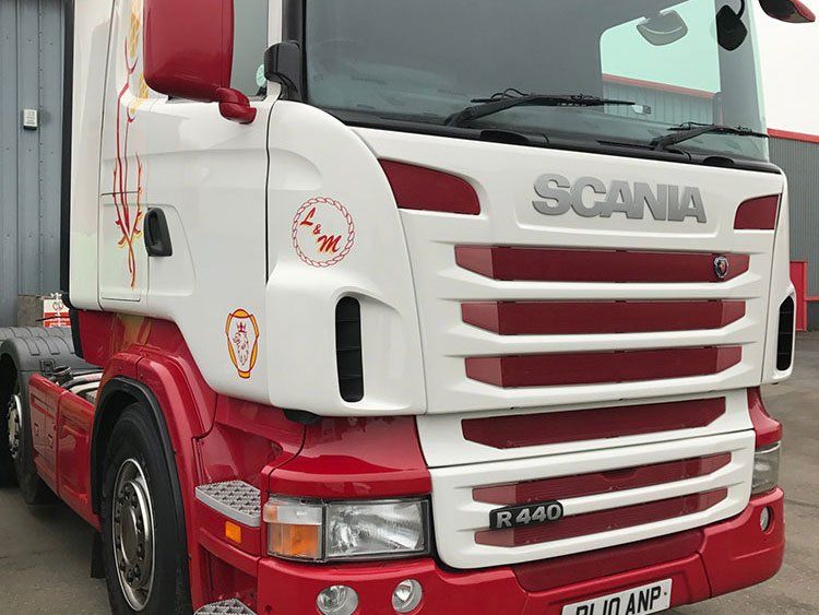 SCANIA HGV with the scuff fixed on the front. Now looking brand new.